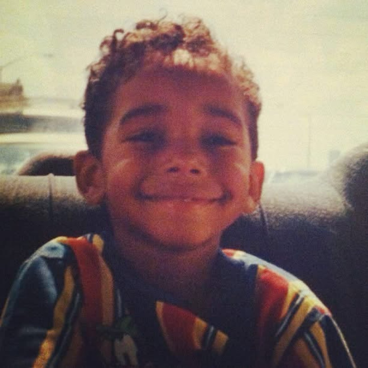 Arik Divine — childhood, the smile that started it all